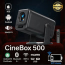 Proyector CineBox 500 negro con control remoto, compatible con iOS, Android, WiFi, HDMI y USB.